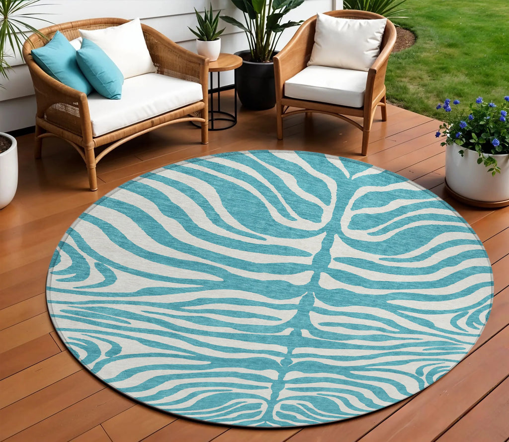 ROUND TEAL ANIMAL PRINT RUG