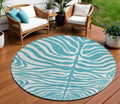 ROUND TEAL ANIMAL PRINT RUG
