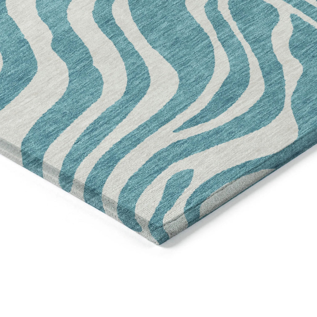 ROUND TEAL ANIMAL PRINT RUG