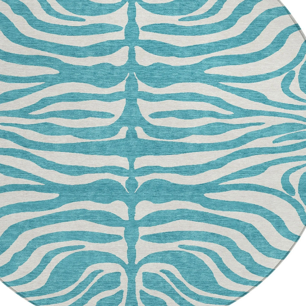 ROUND TEAL ANIMAL PRINT RUG