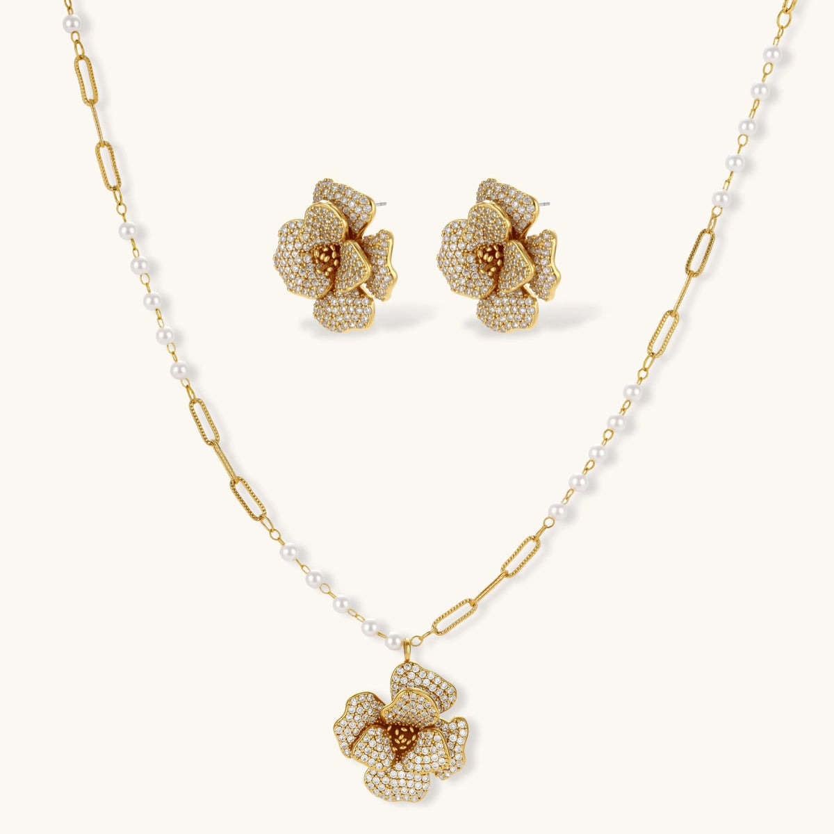 14K gold-plated flower jewelry set with zirconia crystals, featuring dimensional petal necklace and matching earrings